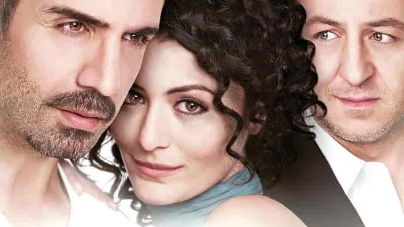 Ya Sonra (2011), face close up of Özcan Deniz and Deniz Çakir with black long curly hair, Baris Falay wearing a balck suit looking at the couple, turkish movie