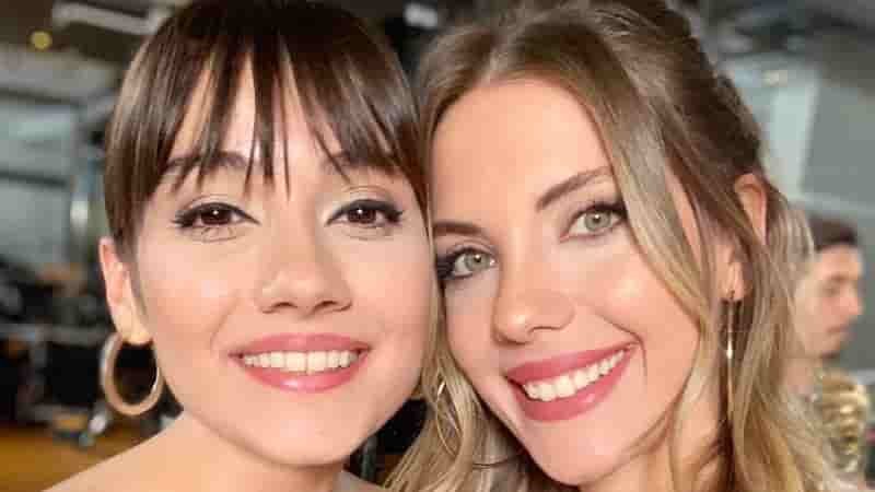 Yasak Elma finale face close up of Eda Ece smiling with blond hair, and Sevda Erginci smiling with black hair