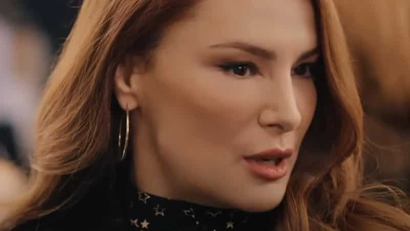 mine tugay close up face with red hair and lips, filled up cheeks plastic surgery yali capkini series dizi