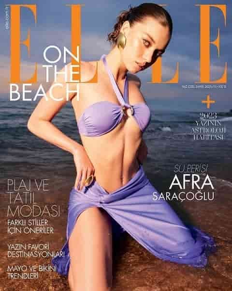 turkish actress sexy on beach Afra Saraçoğlu elle wearing a blue bikini suit shines on the cover of ELLE Magazine, talking about Seyran and Ferit